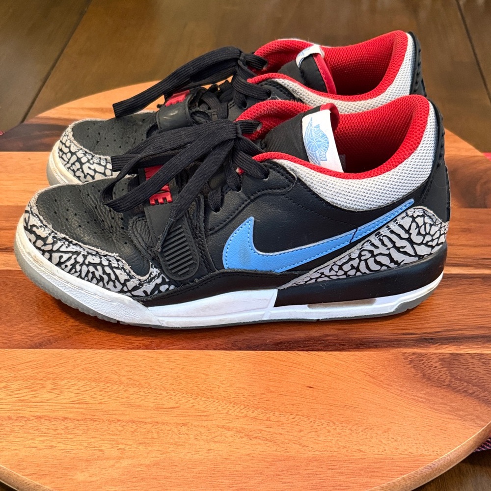 Nike Kids Black and Red Sneakers with Blue Swoosh